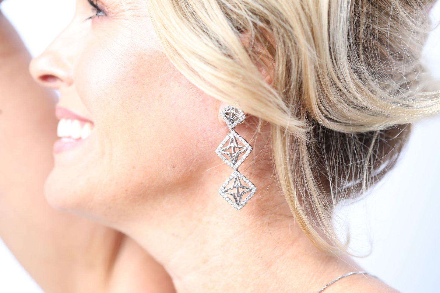 VALENCIA KEY Trinity Dangle Earrings Silver Tone